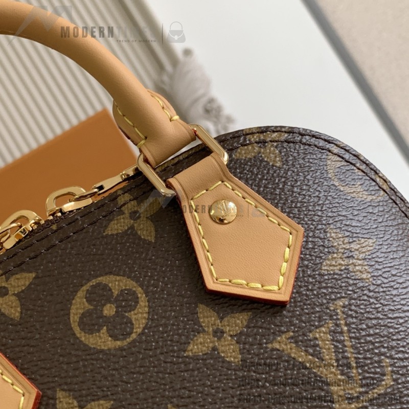 Louis Vuitton Nano Alma Handbag in Monogram Canvas with Leather Trim