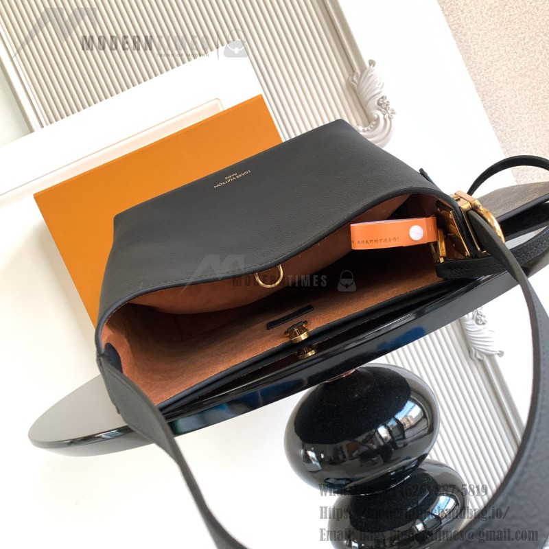 Louis Vuitton Low Key Hobo Bag in grained calfskin leather with adjustable shoulder strap
