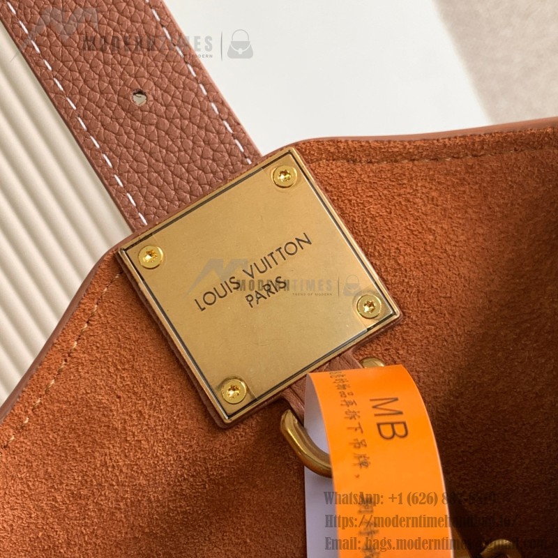 Louis Vuitton Low Key Hobo Bag in grained calfskin leather with adjustable shoulder strap