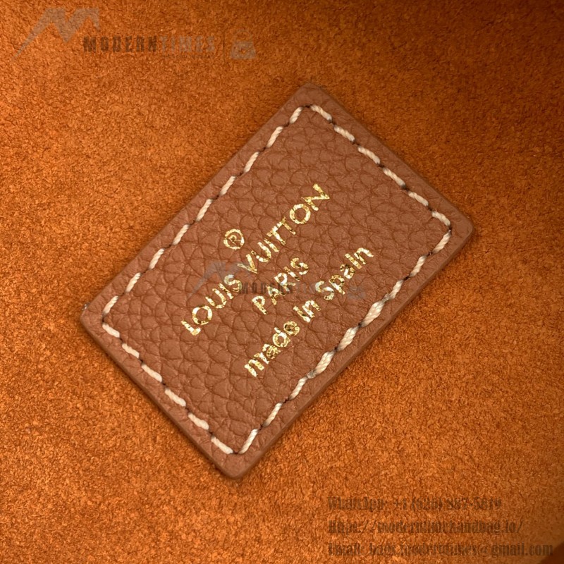 Louis Vuitton Low Key Hobo Bag in grained calfskin leather with adjustable shoulder strap