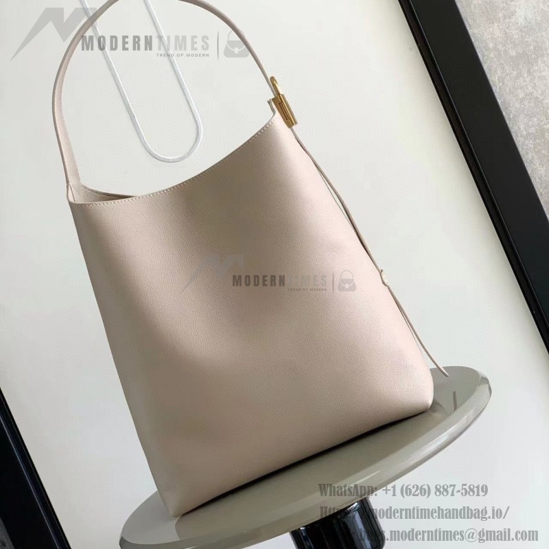 Louis Vuitton Low Key Hobo Bag in grained calfskin leather with adjustable shoulder strap
