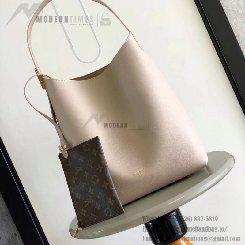 Louis Vuitton Low Key Hobo Bag in grained calfskin leather with adjustable shoulder strap