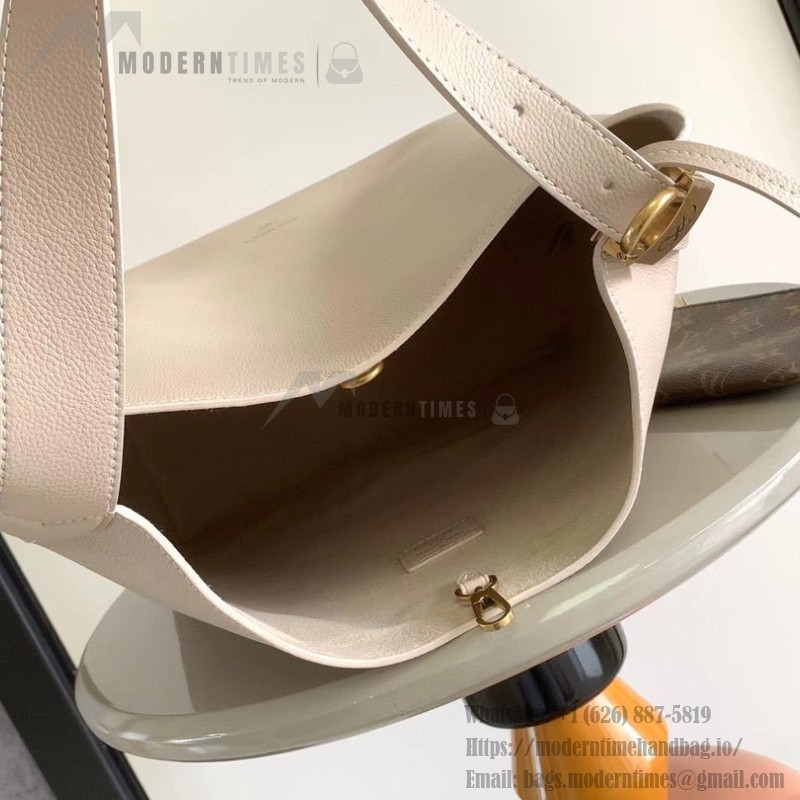 Louis Vuitton Low Key Hobo Bag in grained calfskin leather with adjustable shoulder strap