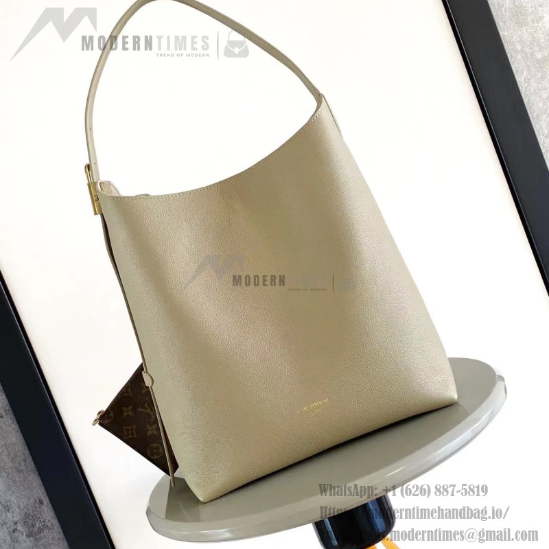 Louis Vuitton Low Key Hobo Bag in grained calfskin leather with adjustable shoulder strap