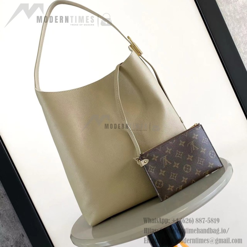 Louis Vuitton Low Key Hobo Bag in grained calfskin leather with adjustable shoulder strap