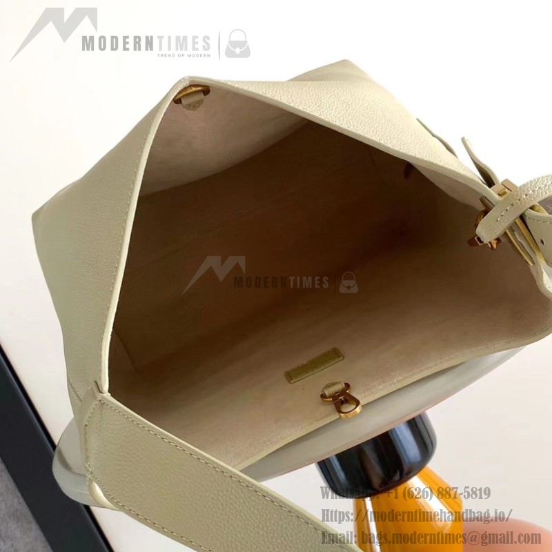 Louis Vuitton Low Key Hobo Bag in grained calfskin leather with adjustable shoulder strap