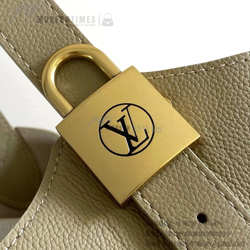 Louis Vuitton Low Key Hobo Bag in grained calfskin leather with adjustable shoulder strap