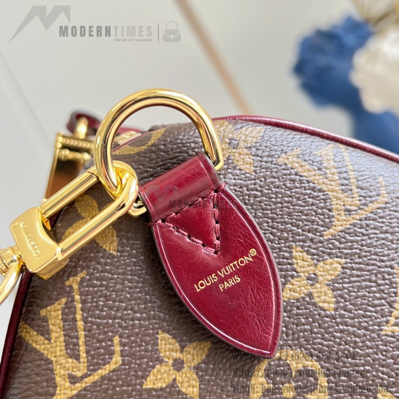Louis Vuitton Speedy Soft 30 Monogram Anniversary handbag in Monogram canvas with leather trim and travel-inspired accessories
