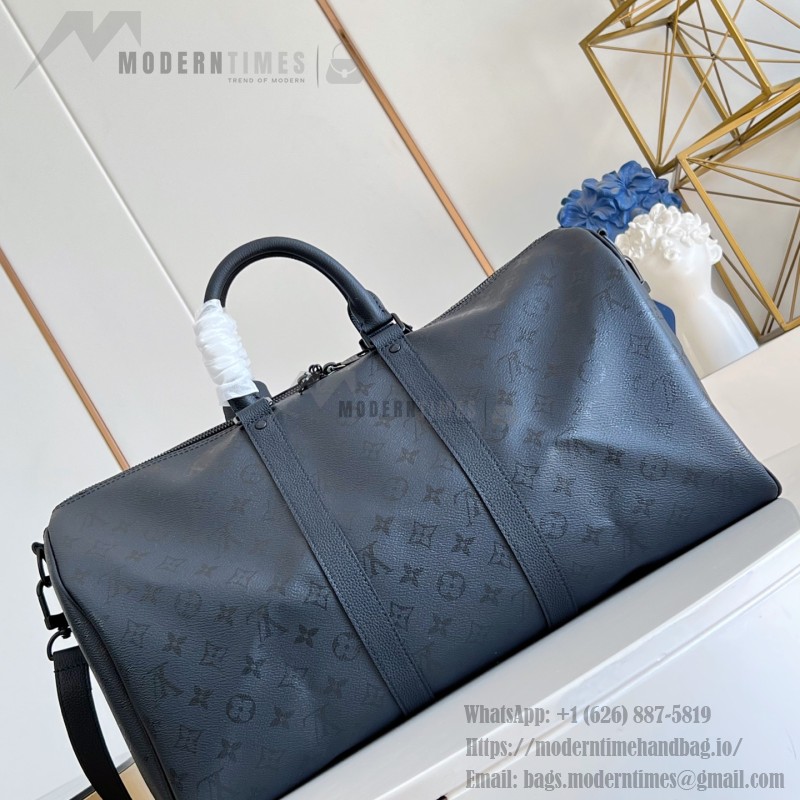 Louis Vuitton Keepall Bandoulière 45 travel bag in Monogram Midnight coated canvas with leather trim