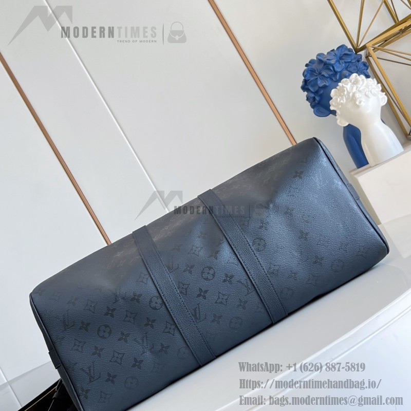 Louis Vuitton Keepall Bandoulière 45 travel bag in Monogram Midnight coated canvas with leather trim