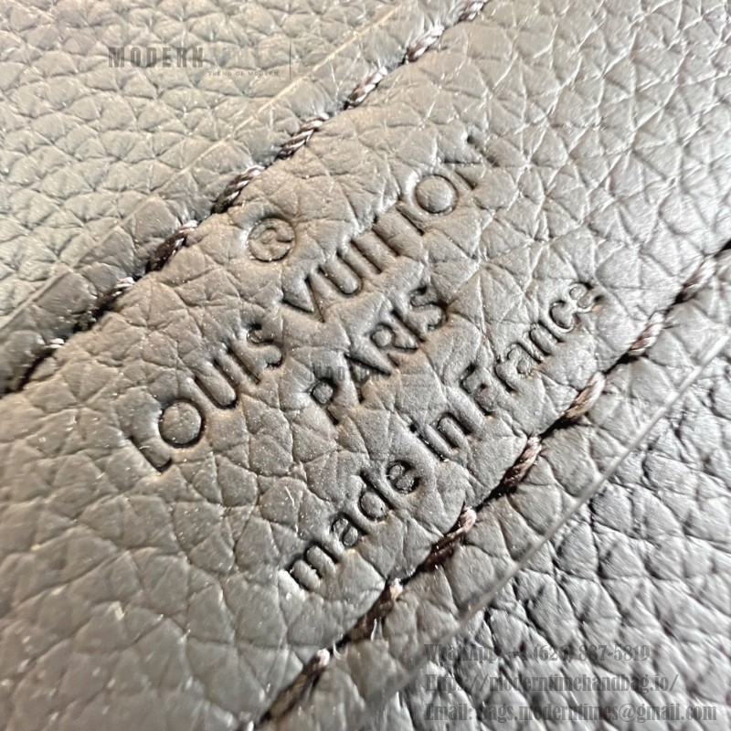 Louis Vuitton Keepall Bandoulière 50 replica travel bag in waxed calfskin leather