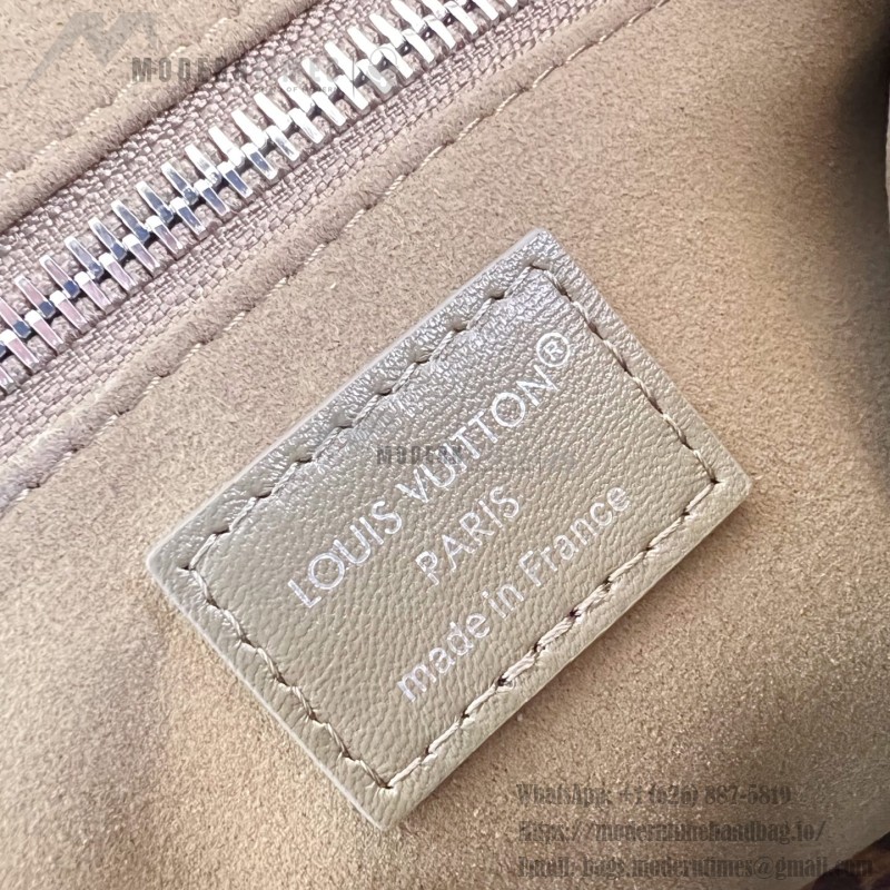 Louis Vuitton CarryAll Vibe MM Handbag in Monogram Empreinte Leather with Detachable LV Tag