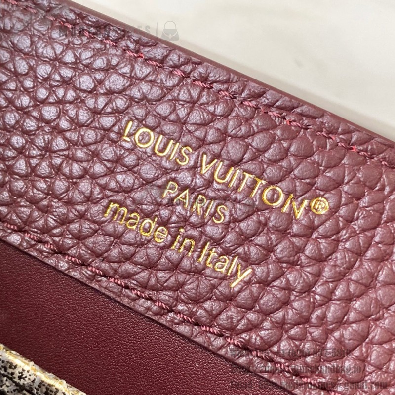 Louis Vuitton Capucines Bag in Burgundy with Golden Snake Handle and Monogram Chain