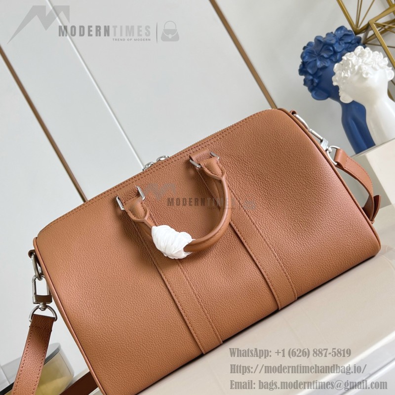 Louis Vuitton Keepall Bandoulière 35 in Waxed Calfskin with LV Initials Embossing