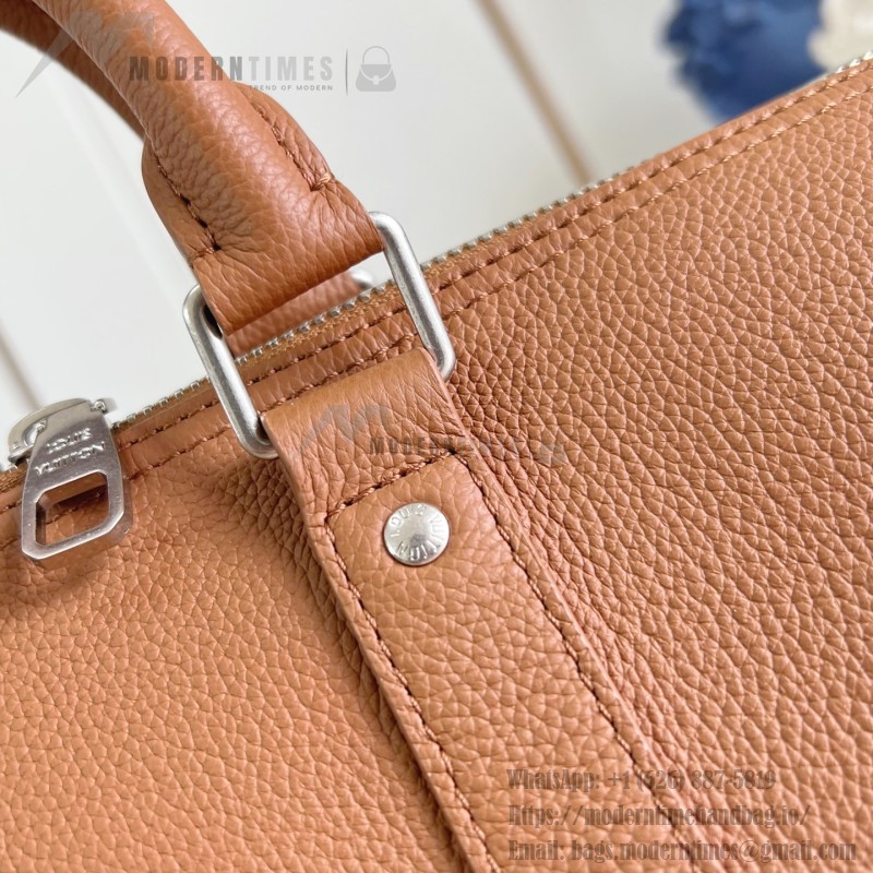 Louis Vuitton Keepall Bandoulière 35 in Waxed Calfskin with LV Initials Embossing