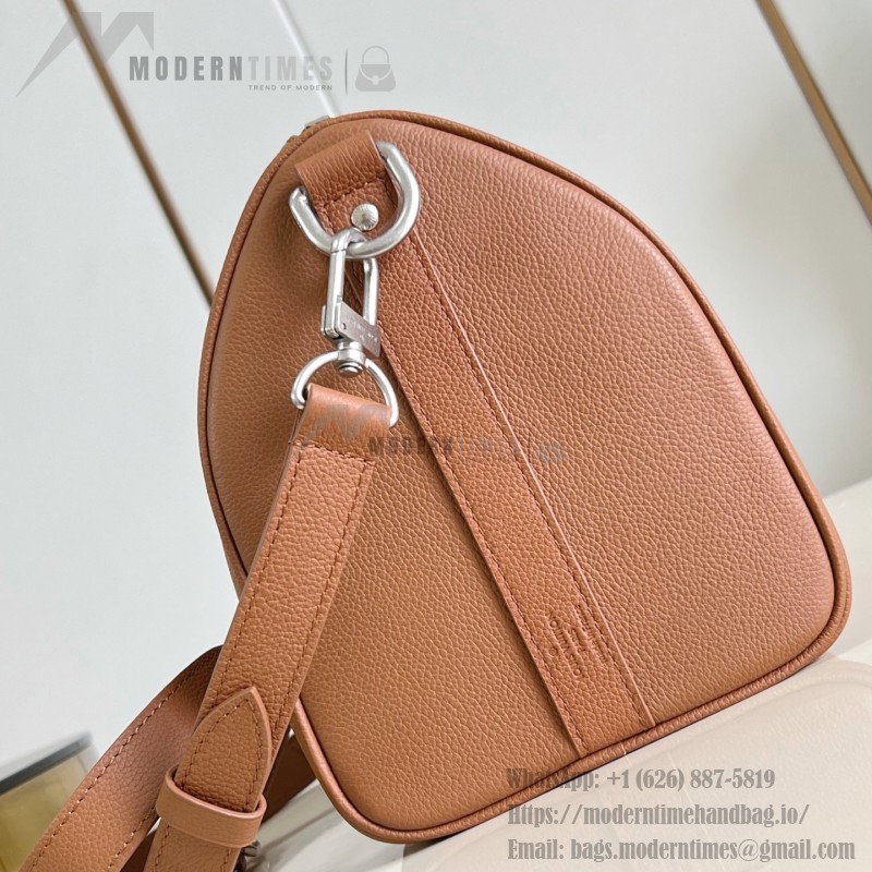 Louis Vuitton Keepall Bandoulière 35 in Waxed Calfskin with LV Initials Embossing