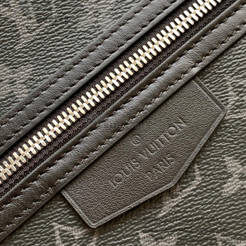 Louis Vuitton Discovery Slim Backpack in Monogram Eclipse Coated Canvas with Front Zipper Pocket