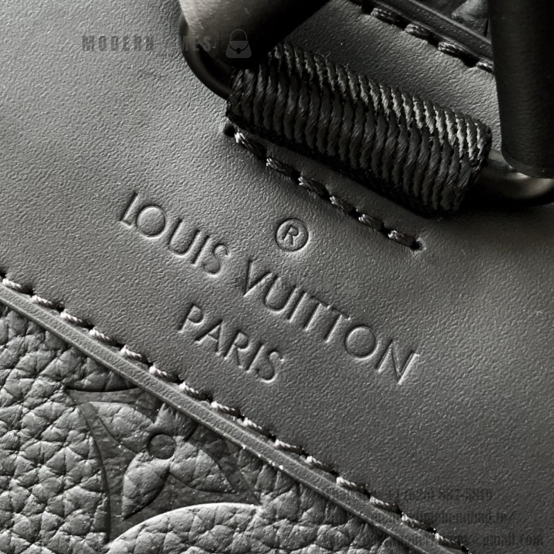 Louis Vuitton Christopher Backpack in Black Taurillon Leather with Monogram Embossing and Side Pockets