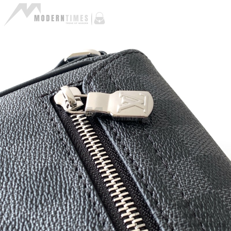 Louis Vuitton District Small Messenger Bag in Taïga Leather with Magnetic Flap and Adjustable Strap
