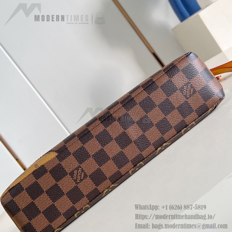 Louis Vuitton Pochette Voyage Souple M26015 in Monogram coated canvas with Boro patchwork, Damier, and Monogram Reverse canvas accents