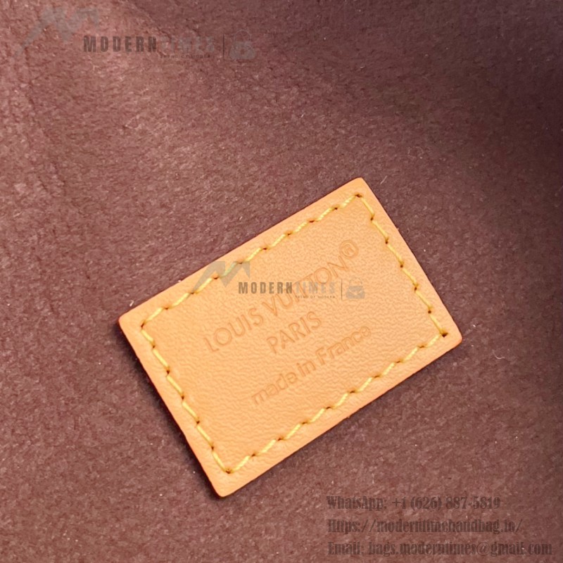 Louis Vuitton Pochette Voyage Souple M26015 in Monogram Canvas with Boro Patchwork