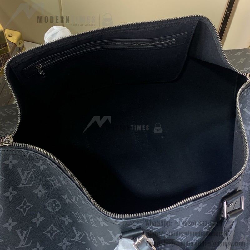 Louis Vuitton Keepall Bandoulière Travel Bag in Monogram Eclipse with Leather Handles and Padlock