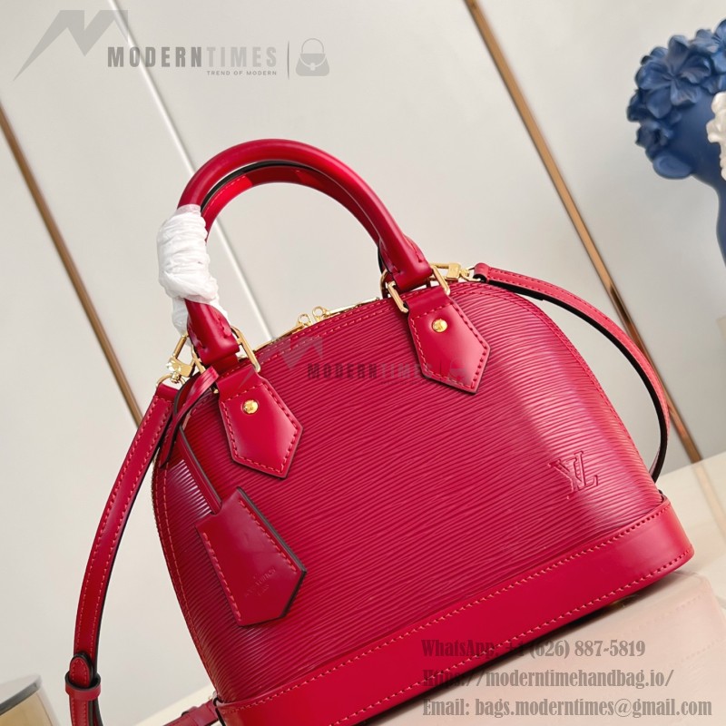 Louis Vuitton Alma BB Epi Leather Handbag with Monogram Jacquard Strap