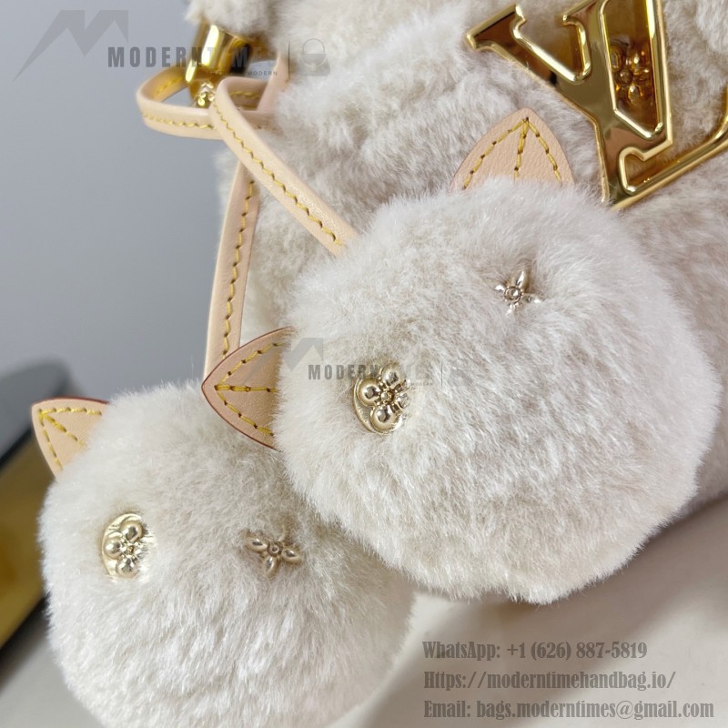 Louis Vuitton Capusnow Bag with Removable Pom-Pom Charms