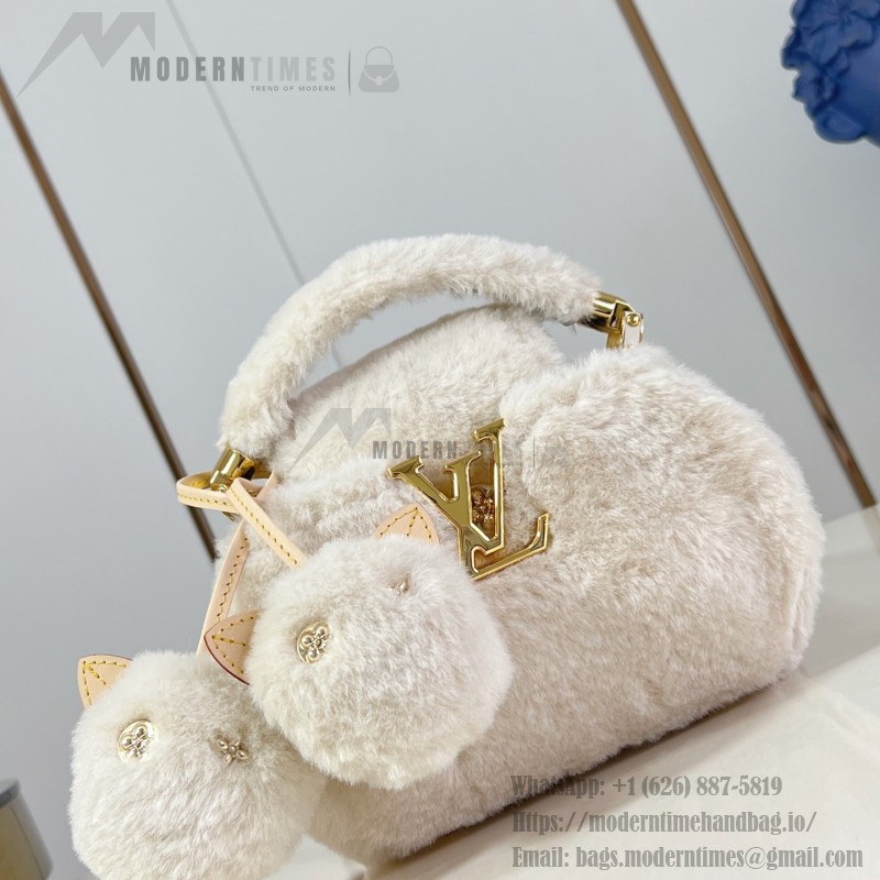 Louis Vuitton Capusnow Bag with Removable Pom-Pom Charms