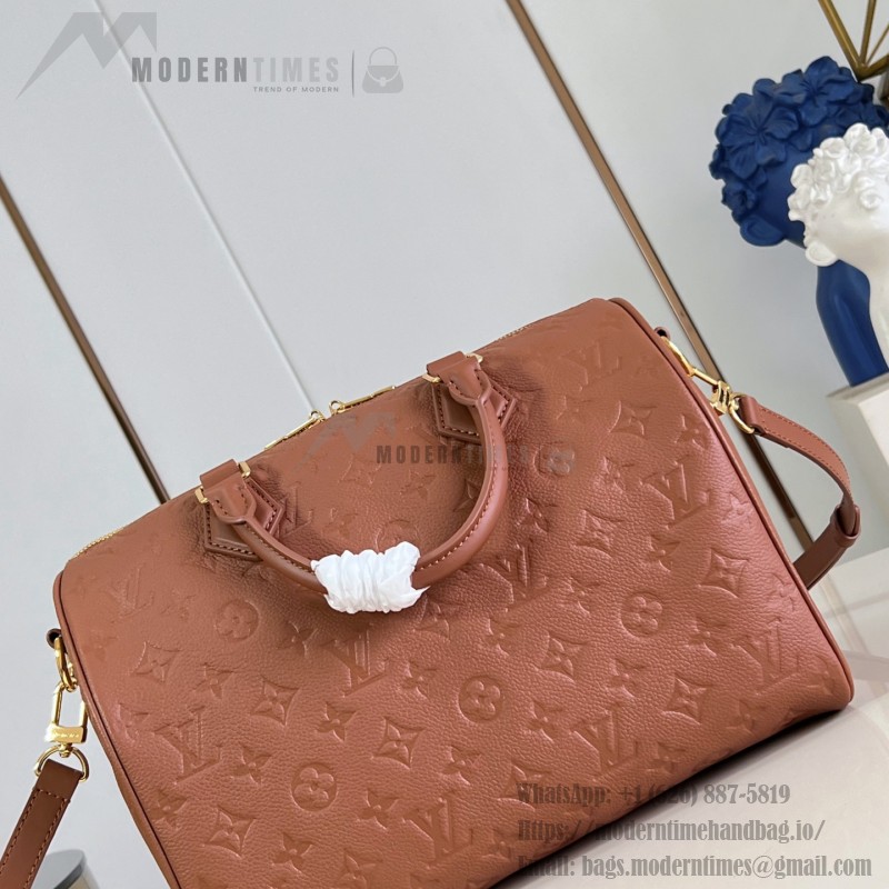 Louis Vuitton Speedy Soft 30 Handbag with Monogram Empreinte Leather and Suede Lining