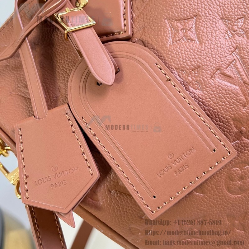 Louis Vuitton Speedy Soft 30 Handbag with Monogram Empreinte Leather and Suede Lining