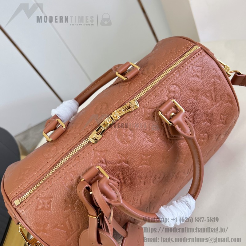 Louis Vuitton Speedy Soft 30 Handbag with Monogram Empreinte Leather and Suede Lining