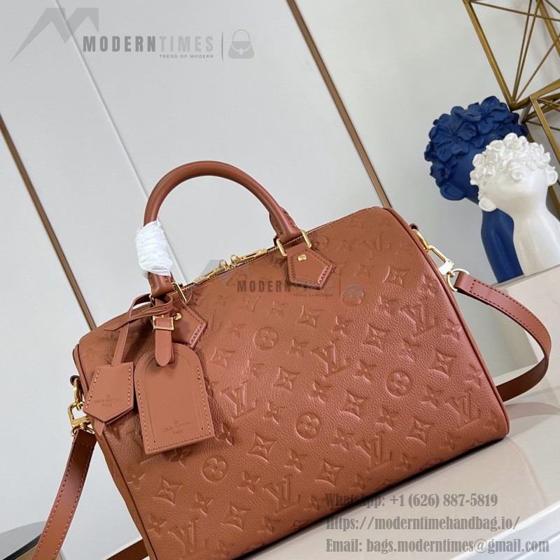 Louis Vuitton Speedy Soft 30 Handbag with Monogram Empreinte Leather and Suede Lining