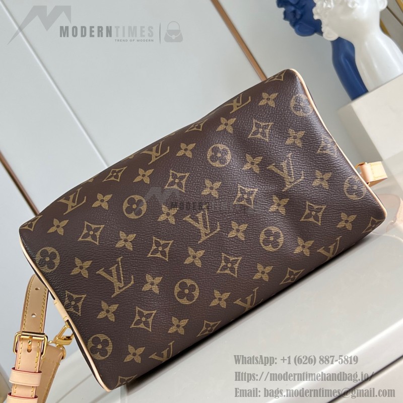 Louis Vuitton Speedy Bandoulière 25 Handbag with Monogram Canvas and Leather Handle