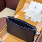 Replica Louis Vuitton M61692 Pochette Voyage in Black Embossed Cowhide Leather