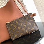 Louis Vuitton Low Key Hobo Bag in grained calfskin leather with adjustable shoulder strap