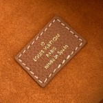 Louis Vuitton Low Key Hobo Bag in grained calfskin leather with adjustable shoulder strap