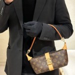 Louis Vuitton Pochette Voyage Souple M26015 in Monogram Canvas with Boro Patchwork