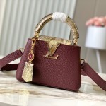 Louis Vuitton Capucines Bag in Burgundy with Golden Snake Handle and Monogram Chain