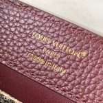 Louis Vuitton Capucines Bag in Burgundy with Golden Snake Handle and Monogram Chain
