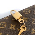 Louis Vuitton Montaigne BB Monogram canvas handbag with shoulder strap