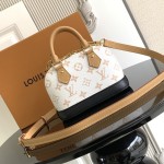 Louis Vuitton Nano Alma Handbag in Monogram Canvas with Leather Trim