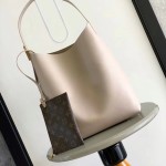 Louis Vuitton Low Key Hobo Bag in grained calfskin leather with adjustable shoulder strap