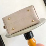 Louis Vuitton Low Key Hobo Bag in grained calfskin leather with adjustable shoulder strap