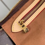 Louis Vuitton Speedy Bandoulière 25 Handbag with Monogram Canvas and Leather Handle