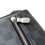 Louis Vuitton District Small Messenger Bag in Taïga Leather with Magnetic Flap and Adjustable Strap