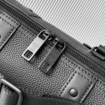 Louis Vuitton City Keepall Handbag in Aerogram Leather with LV Metal Letters and Detachable Shoulder Strap