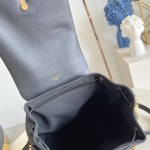 LV Coussin Backpack Medium Black replica with monogram embossed leather