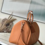 Louis Vuitton Keepall Bandoulière 50 Travel Bag in Caramel Waxed Leather with LV Initials and Antiqued Metal Hardware