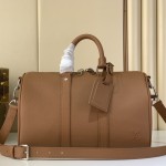 Louis Vuitton Keepall Bandoulière M25980 and M26065 Waxed Cowhide Leather with LV Embossing
